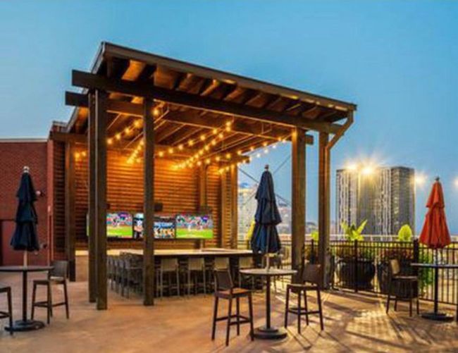 Watch the Tn Titans with friends out on the rooftop! | Image 20