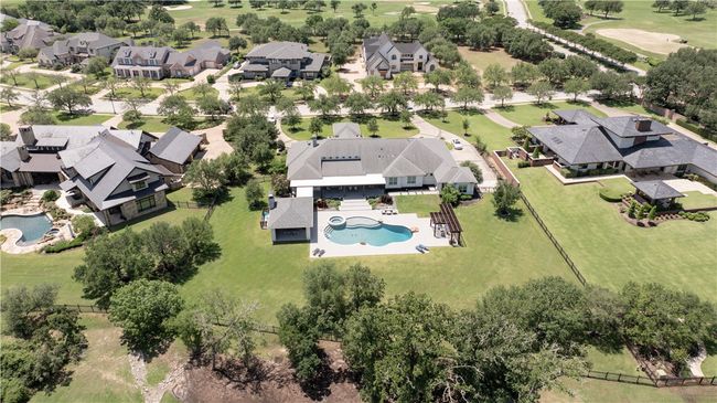 Aerial view of residential area with a pool | Image 33