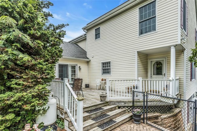Private Back of House with a Deck and Entrance into Townhouse | Image 35
