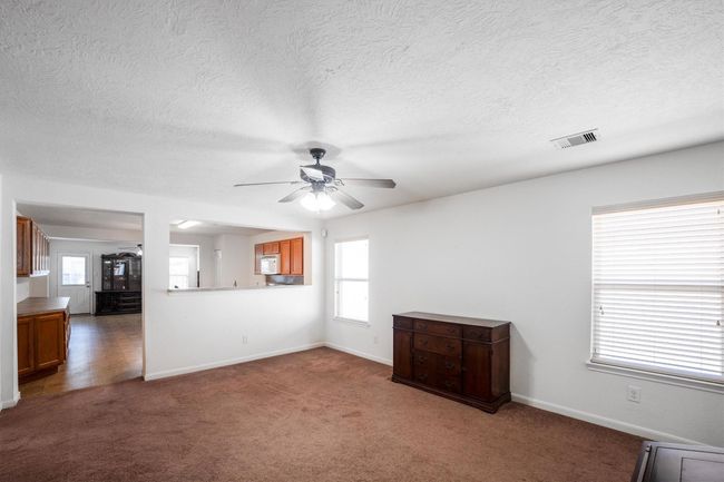 view the living room from the kitchen | Image 4