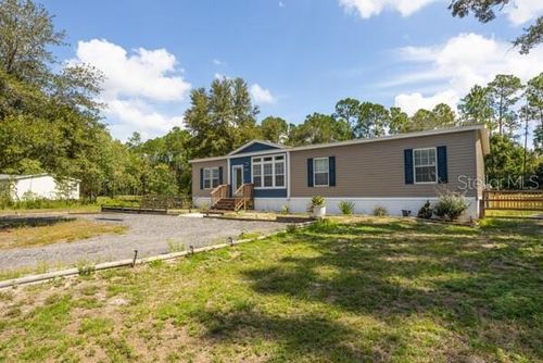 1225 Hazelnut St, BUNNELL, FL, 32110-6731 | Card Image
