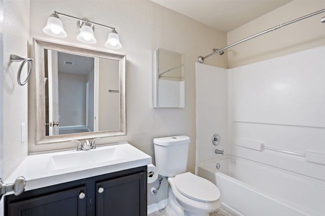 Bathroom featuring shower combination and vanity | Image 32