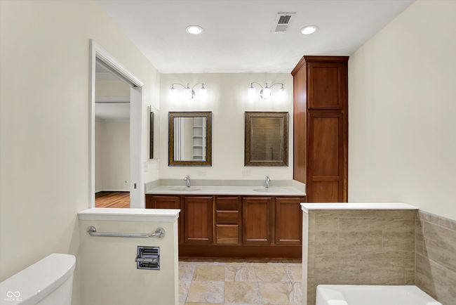 Lovely bathroom w/ solar tube to allow natural light throughout the day. | Image 35