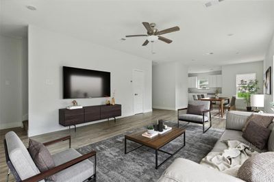 Living room with ceiling fan and dark hardwood / wood-style floors | Image 2