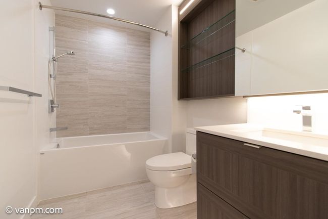 Full bathroom with toilet, vanity, shower / tub combination, and recessed lighting | Image 11