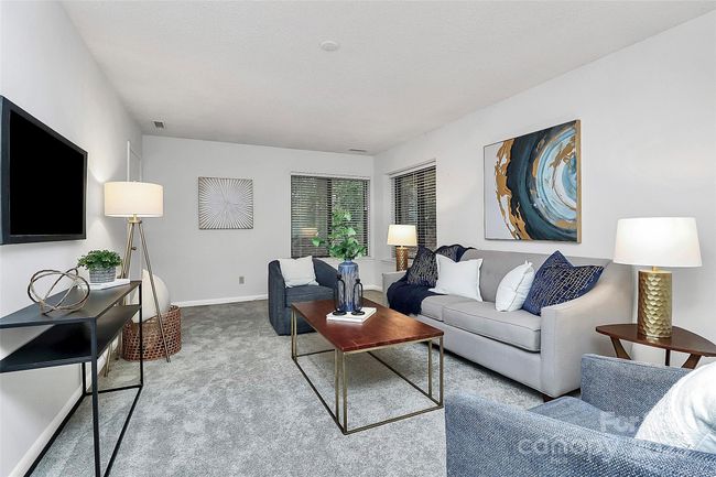 Spacious basement recreation room or additional living area is walkout to the lower deck, also overlooking Lake Wylie. | Image 15