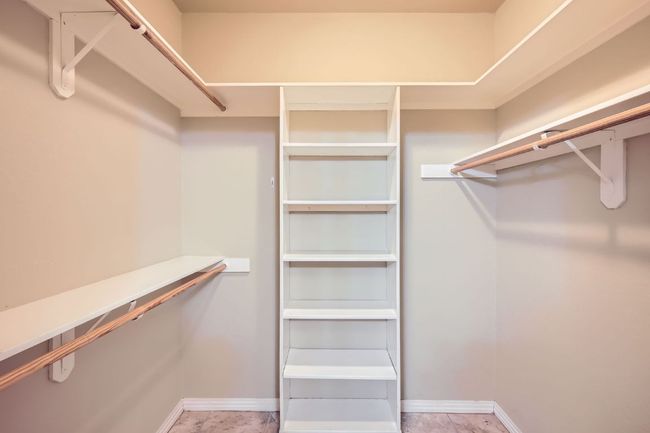 View of spacious closet | Image 13