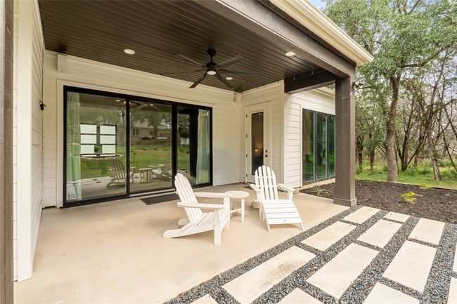View of patio / terrace with ceiling fan | Image 32