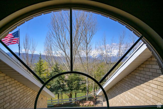 Exterior details with a mountain view and brick siding | Image 36