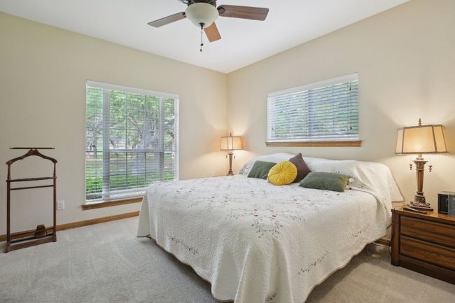 Bedroom featuring baseboards, carpet, and a ceiling fan | Image 16