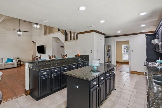 Center island with lots of storage. Walk in pantry | Image 12