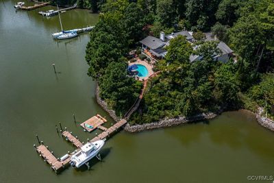 Bird's eye view showing new dock, pool and renovated home. Rip Rap to protect all the way around | Image 2