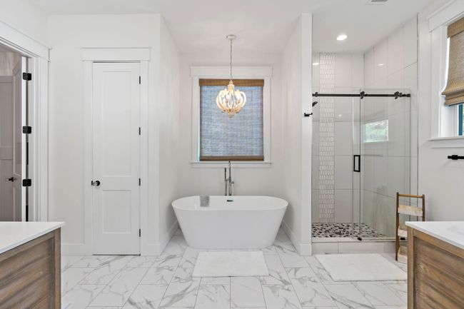 Large primary bath with tub and separate shower. | Image 23