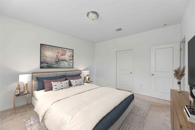 The spacious primary suite offers a peaceful retreat with plenty of room to relax and unwind. *Virtually Staged* | Image 6