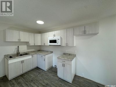 1221 108 Th St, Home with 4 bedrooms, 2 bathrooms and null parking in North Battleford SK | Image 3