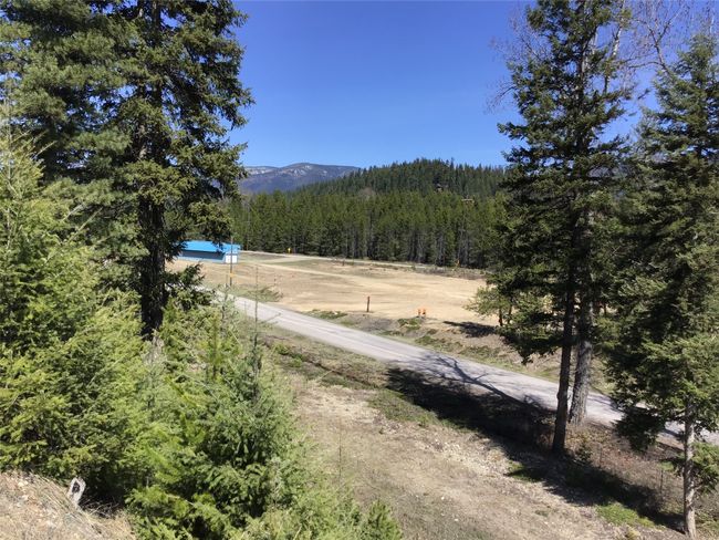1+ acre level home site | Image 66