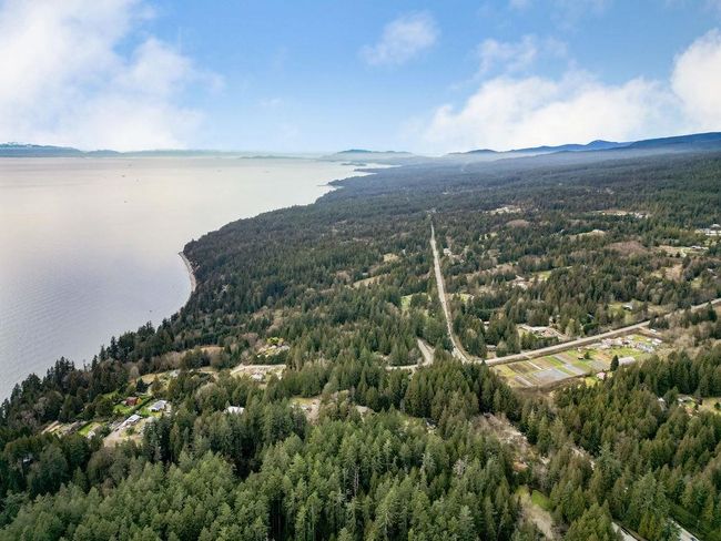 Aerial view with a forest view and a water view | Image 35