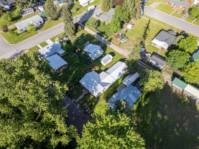 Aerial overview of property's location with nearby suburban area | Image 41