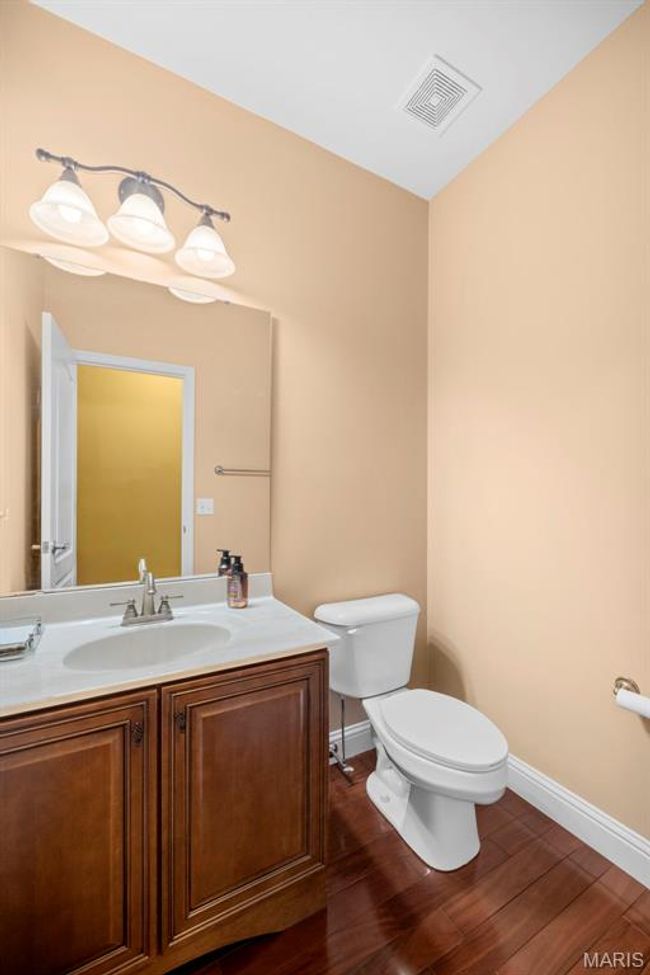 Main Level Powder Room 2 tucked just off the Foyer/ Great Room. | Image 33