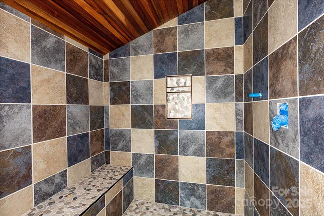 Bonus room on the main level currently used as a bunk room. Ideal for a, meditation, office or exercise area. | Image 21
