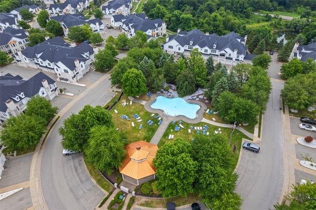 This walkable community has a roundabout with a gazebo at the center. | Image 36