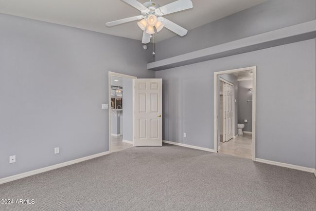 WITH CEILING FAN SHOWING ENTRANCE TO PRIMARY BATH | Image 27