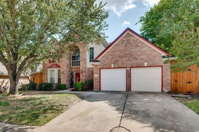 View of front facade with a garage | Image 2