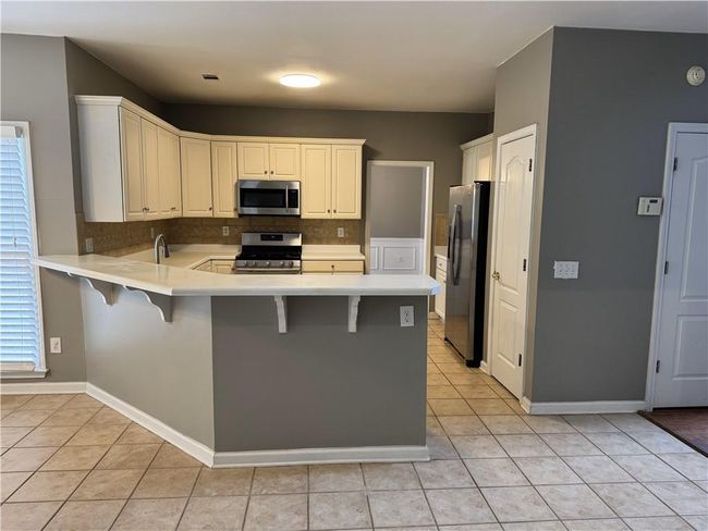 1434 Oglethorpe Dr, House other with 4 bedrooms, 3 bathrooms and null parking in Suwanee GA | Image 10