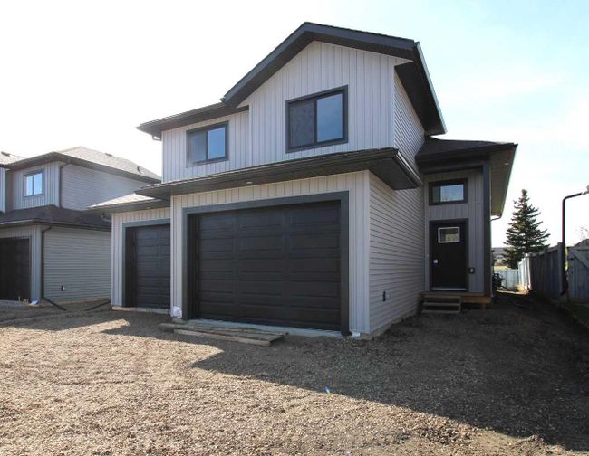 9130 Lakeland Drive, Home with 5 bedrooms, 3 bathrooms and 2 parking in Grande Prairie AB | Image 1