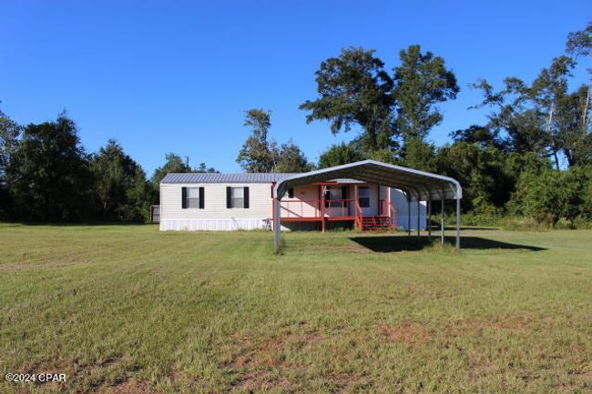 15510 Nw Jw Rackley St, House other with 4 bedrooms, 2 bathrooms and null parking in Altha FL | Image 4