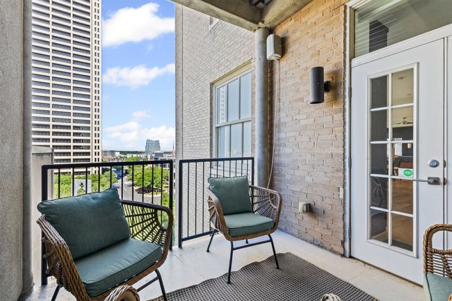 Balcony featuring a view of city | Image 4