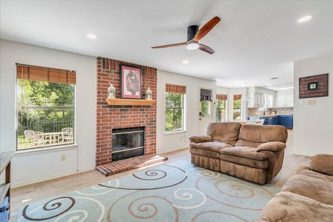 2nd Living room (Den) is located adjacent to the kitchen & breakfast area, and features newly installed can lighting! | Image 13