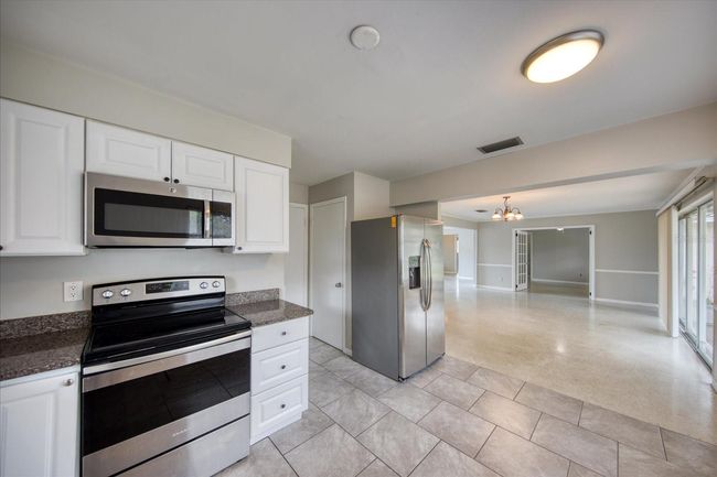1901 Dolphin Dr, House other with 3 bedrooms, 2 bathrooms and null parking in BELLEAIR BLUFFS FL | Image 9