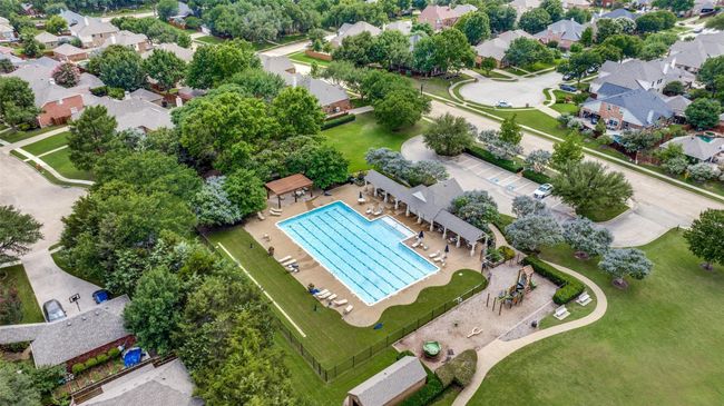 Aerial view of residential area featuring a pool area | Image 36