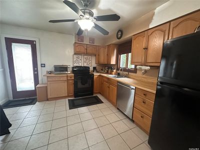 Kitchen with a favorable amount of counter space | Image 3