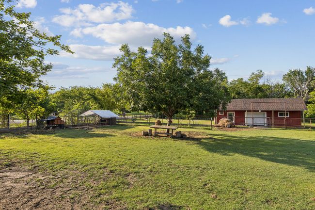 View of yard featuring an outdoor structure and exterior structure | Image 30