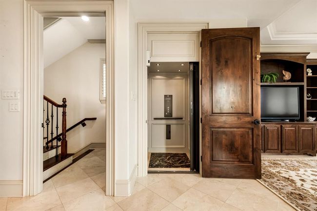 Well appointed luxury elevator takes you from ground level, to first and second floors (3 stops in total). | Image 24