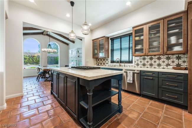 Newly renovated kitchen, new cabinets and counter tops, new island and facing the dining area on left. | Image 7