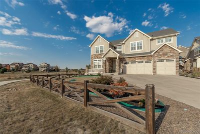 Oakwood Homes Broadmoor model with 8 bedrooms and 5 bathrooms. Located in the end of a cul-de-sac with a green belt to the left of the home. | Image 3