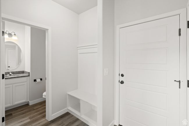 Mudroom featuring wood finished floors and a sink | Image 15
