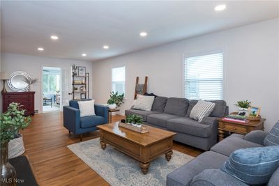 Living room featuring hardwood / wood-style flooring | Image 2