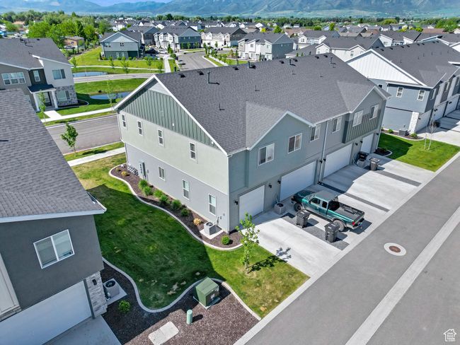 Aerial view of residential area featuring a mountain backdrop | Image 24