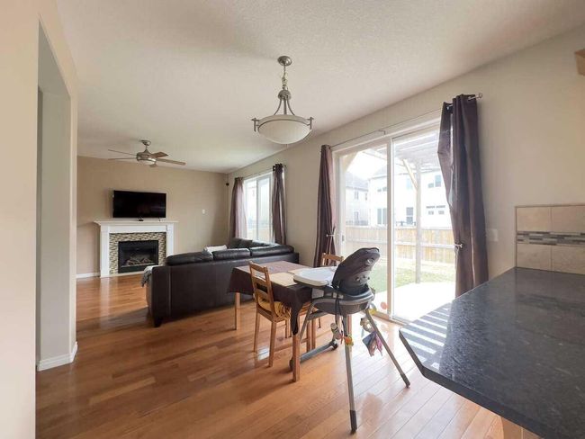 609 Windridge Road Sw, Home with 3 bedrooms, 2 bathrooms and 4 parking in Airdrie AB | Image 7