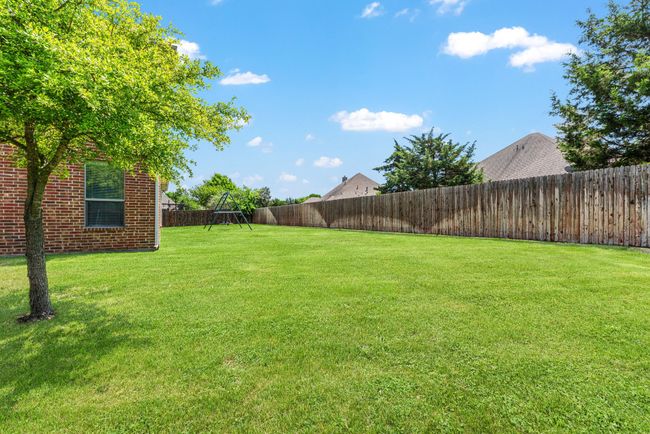 View of yard with a fenced backyard | Image 37