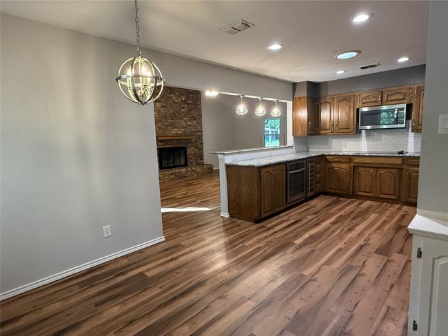 lovely kitchen with dining area | Image 4