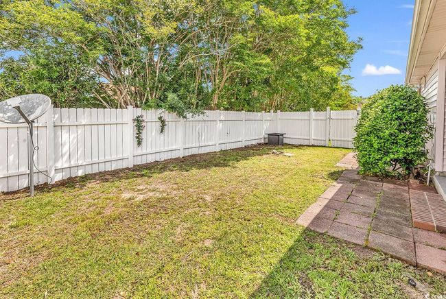View of yard featuring a fenced backyard | Image 20