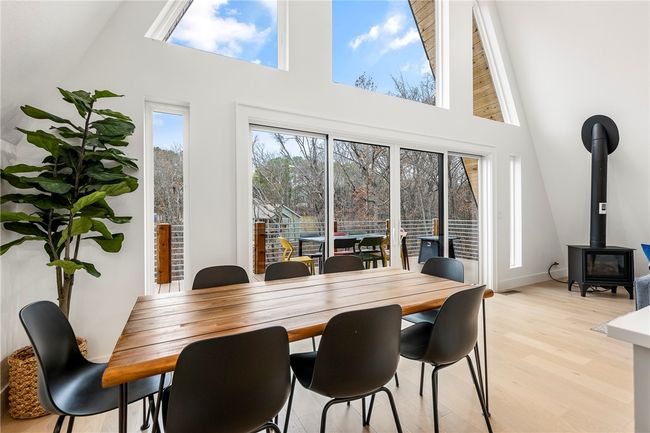 Eating area with massive windows | Image 10