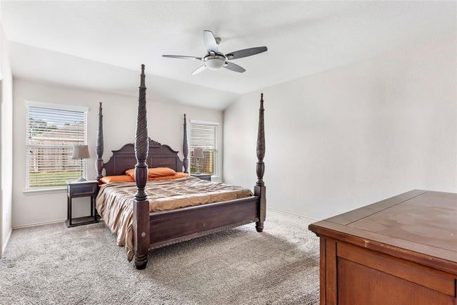 The primary bedroom does not disappoint with lots of room and an en-suite bathroom. | Image 4