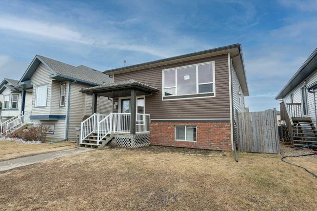 8925 70 Avenue, Home with 3 bedrooms, 2 bathrooms and 3 parking in Grande Prairie AB | Image 1