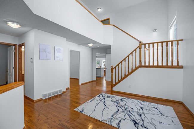 240 Arbour Ridge Way Nw, House other with 6 bedrooms, 4 bathrooms and 4 parking in Calgary AB | Image 6